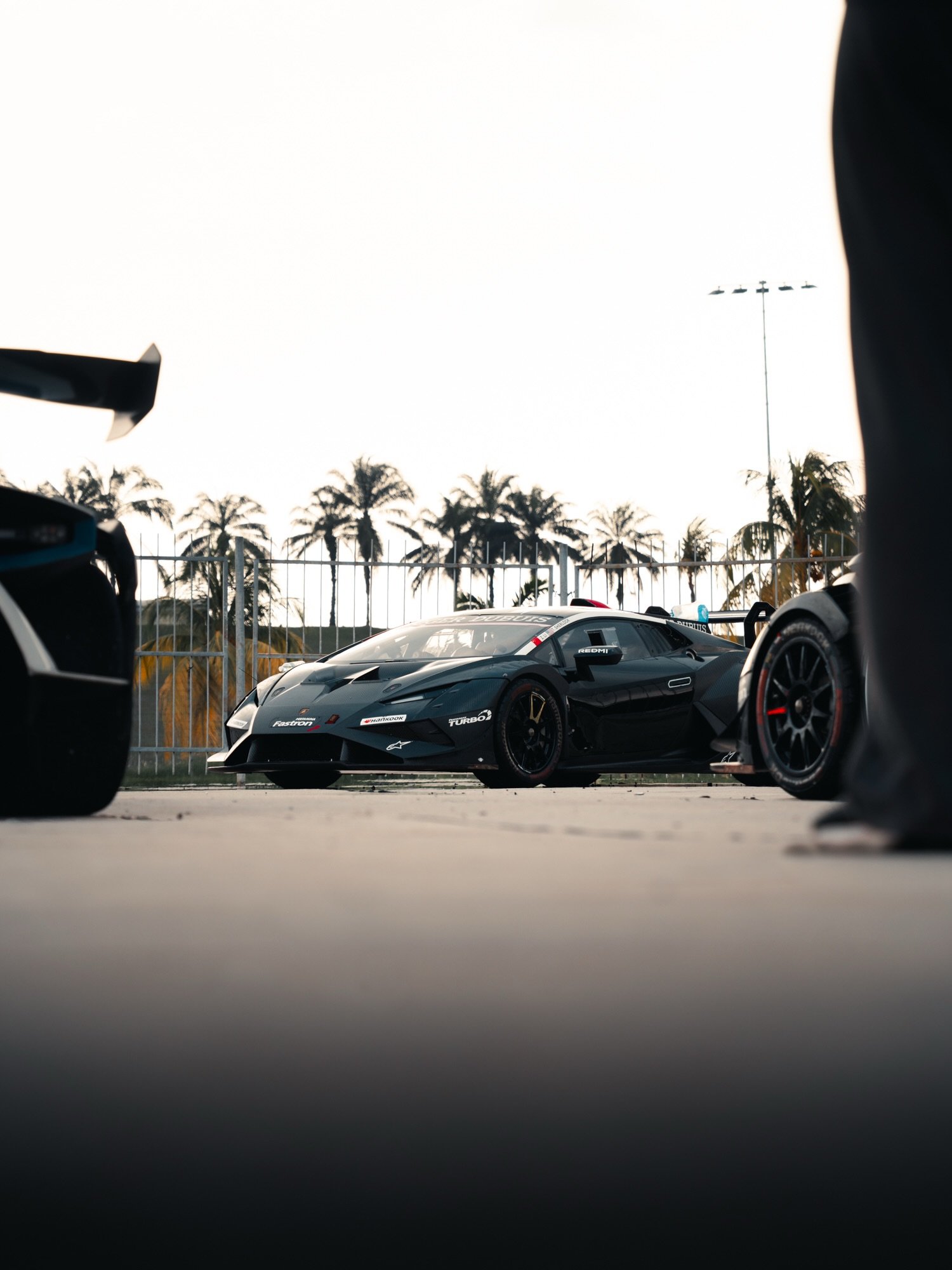 Automotive graded image with controlled warm highlights and darker foreground